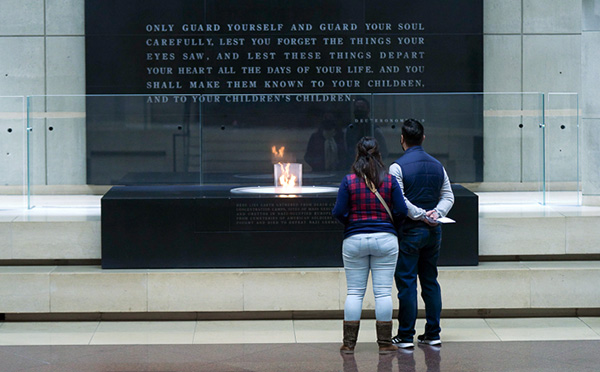 couple looking at memorial